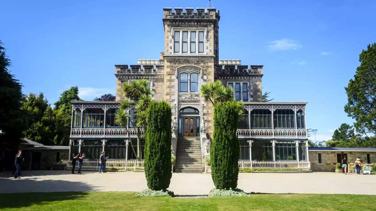 Old castle with garden and blue skies  Main Image