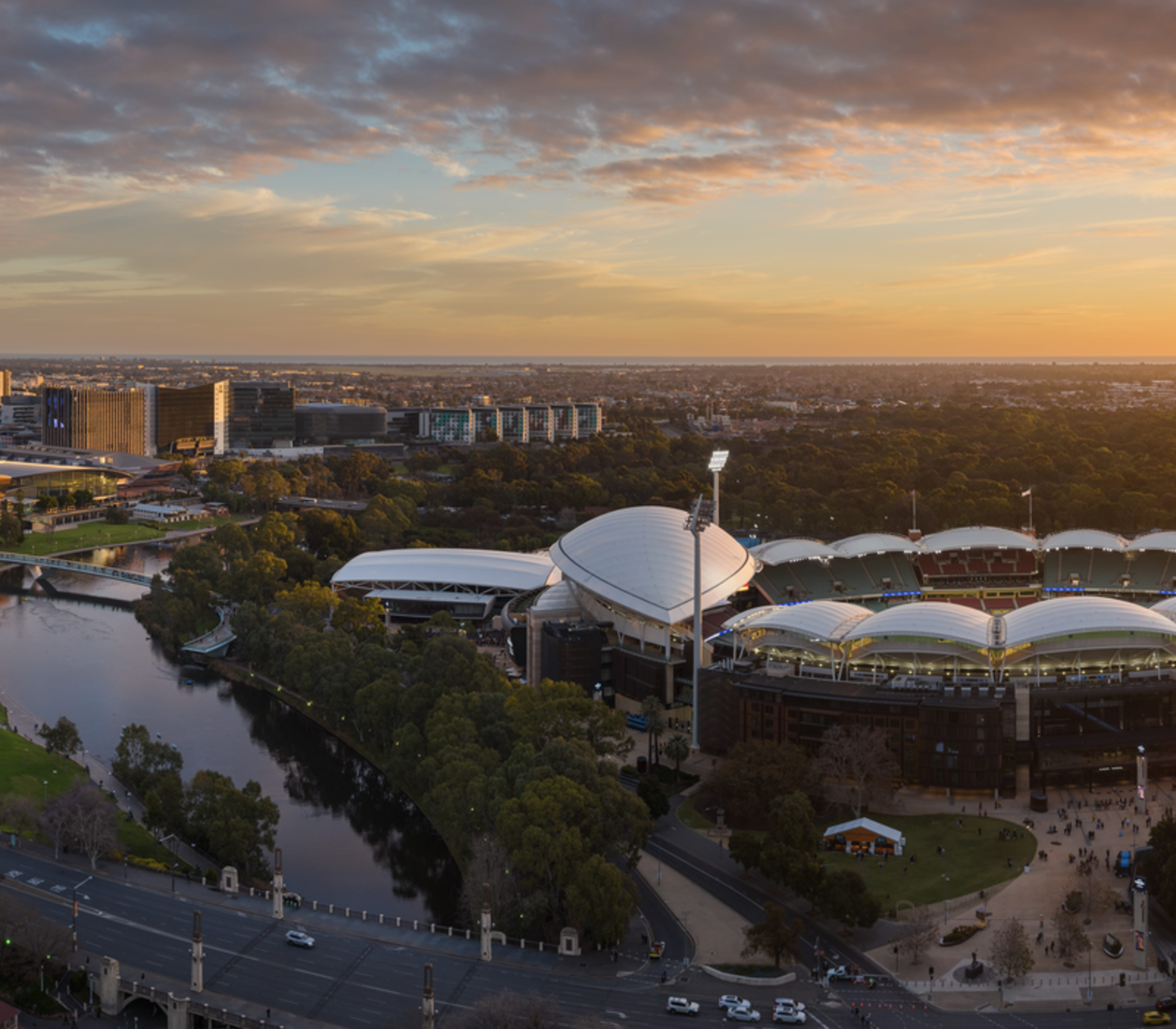 Sunset over the Adelaide Oval stadium and river precinct in South Australia.