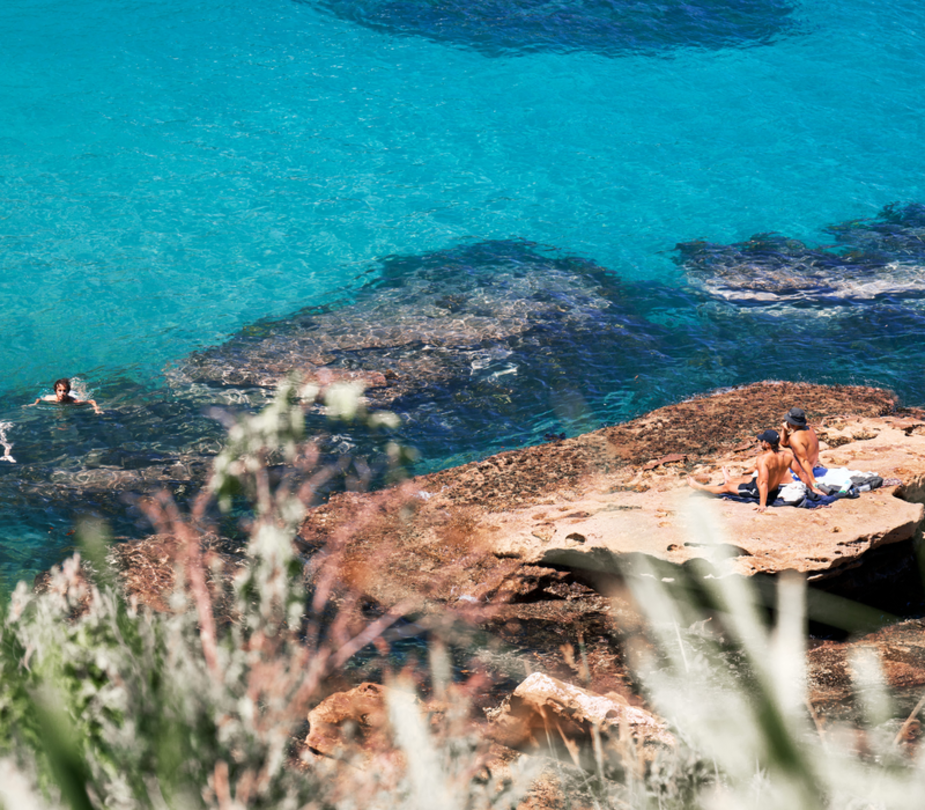 People swimming in Gordons Bay Sydney NSW