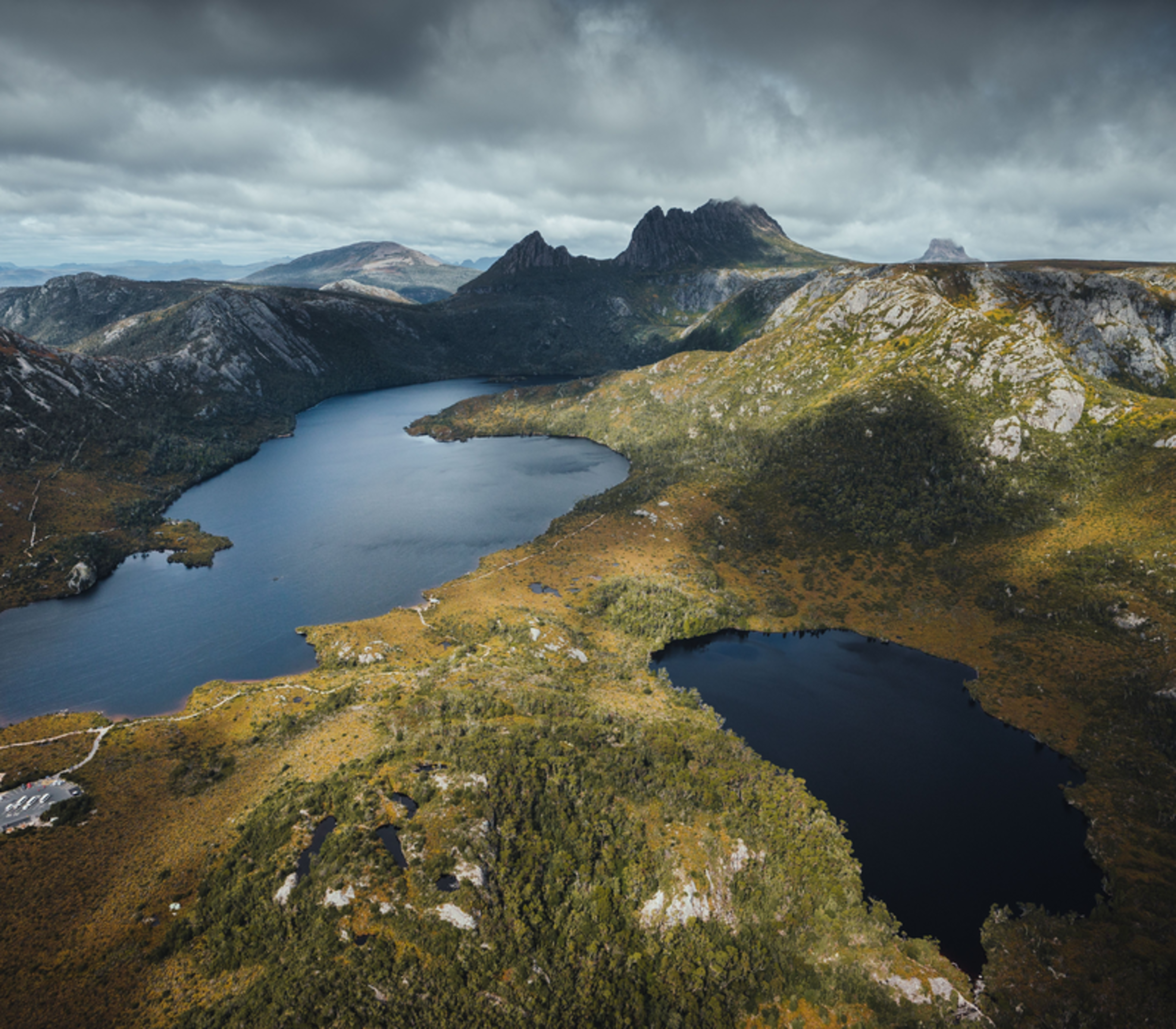 High angle aerial view of Dove Lake and surrounding alpine vegetation in Cradle Mountain National Park.